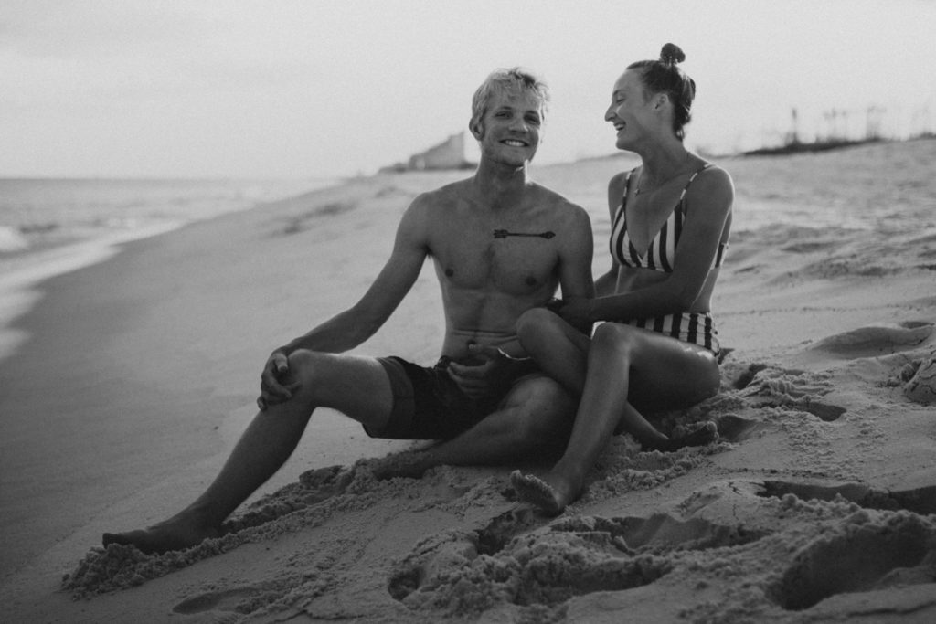 adventurous couple date night on beach